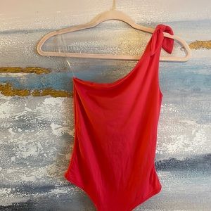 One shoulder coral/orange body suit